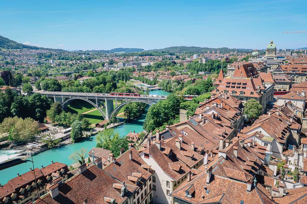 Bern rooftops and bridge over turquoise river