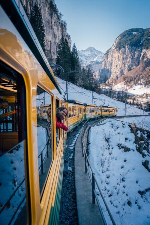 How To Get To Lauterbrunnen, Switzerland (2025 Guide) 17 Yellow train ride from Wengen to snowy Lauterbrunnen