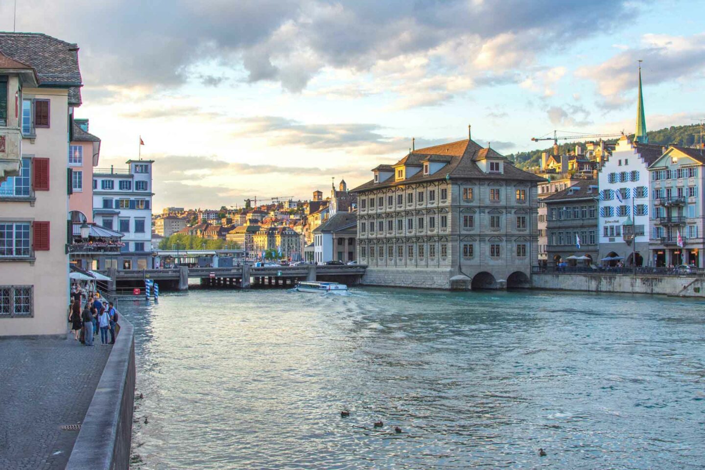 Riverside buildings and bridge in Zurich old town.
